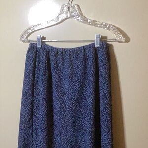 Long slim skirt with back vent